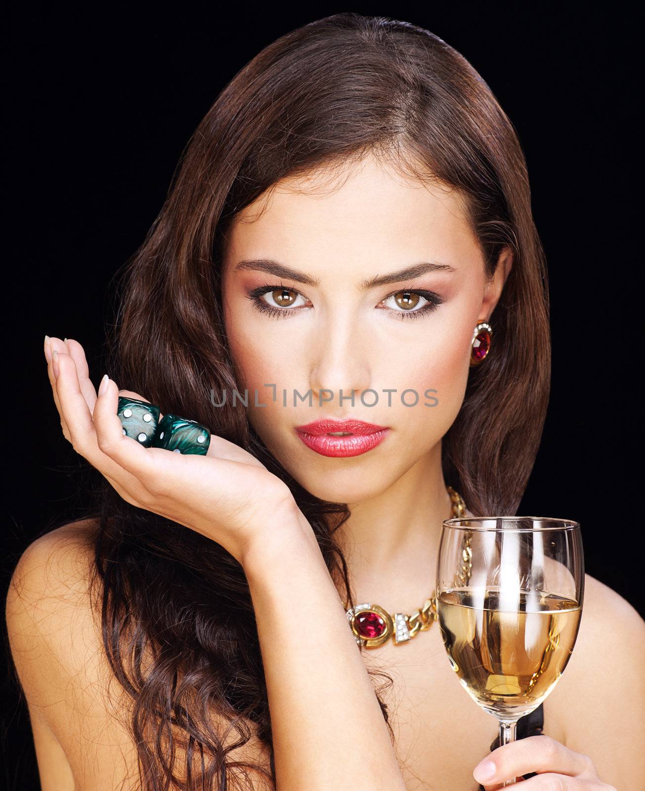 woman holding gamble dices and wine by imarin