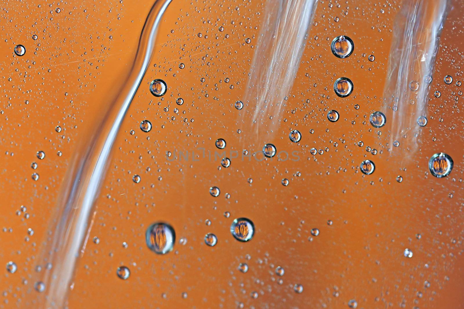 Macro picture of water droplets on window, shallow DOF