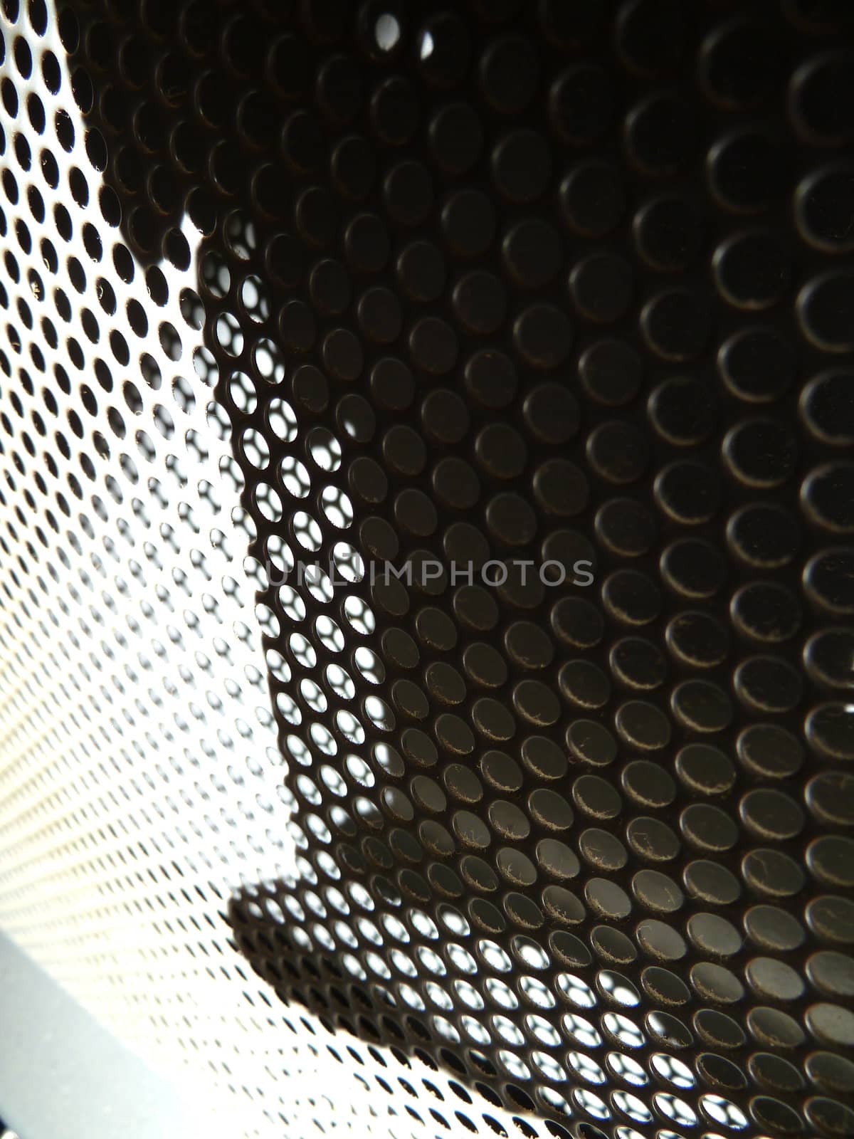metal grill with shadow and light