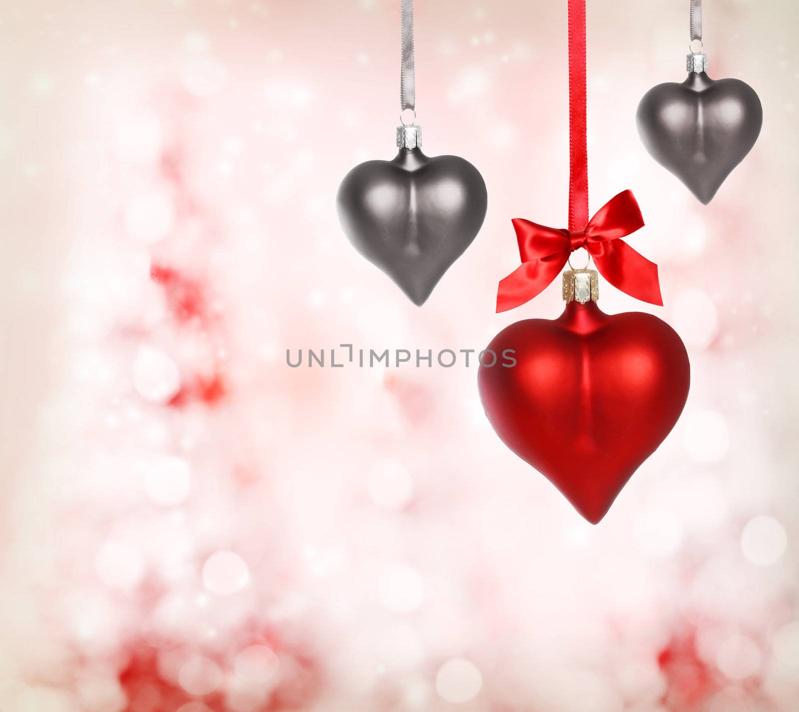 Valentine heart ornaments with pink light background