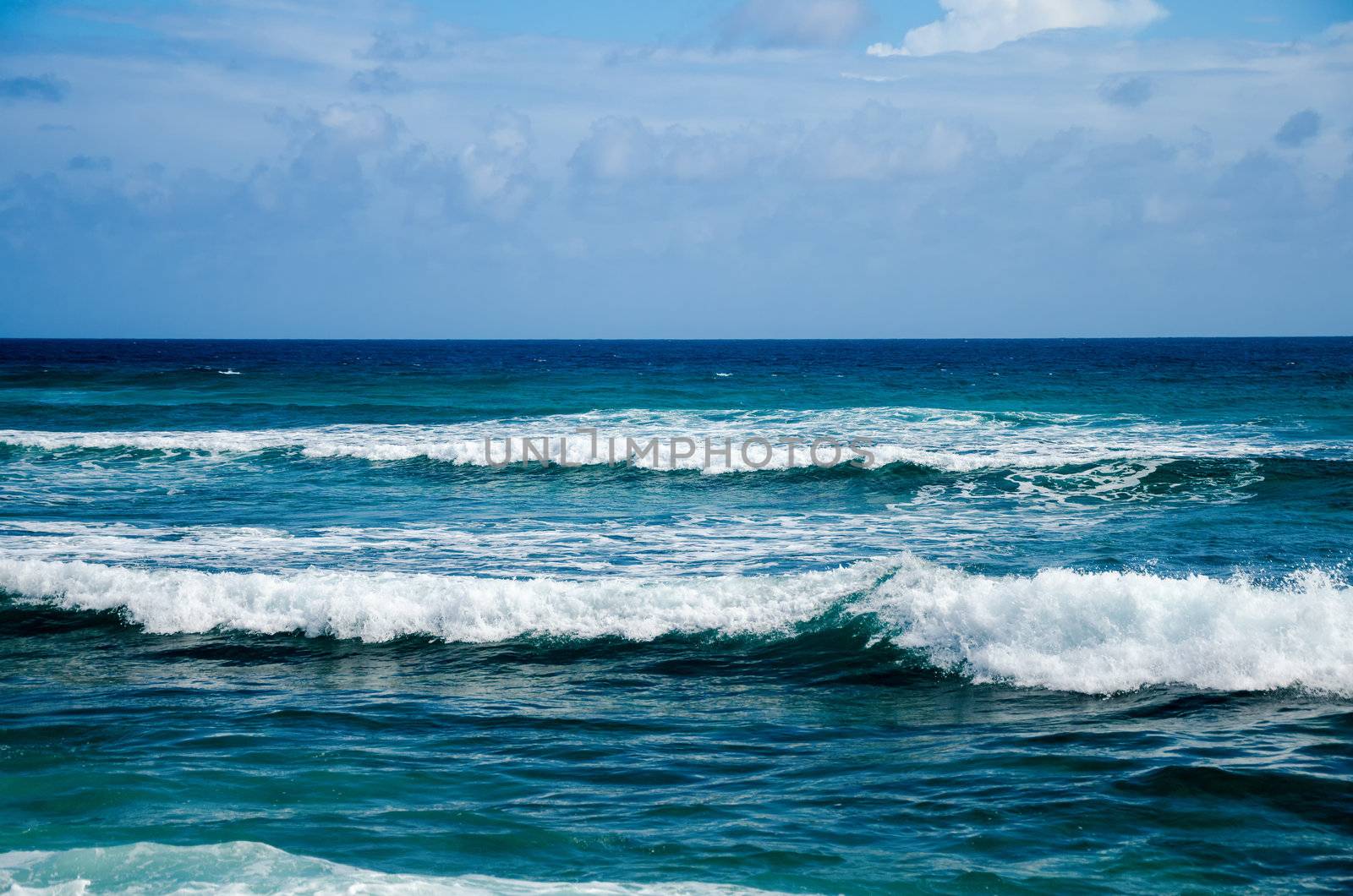 Blue ocean waves coming to shore in San Andres y Providencia, Colombia