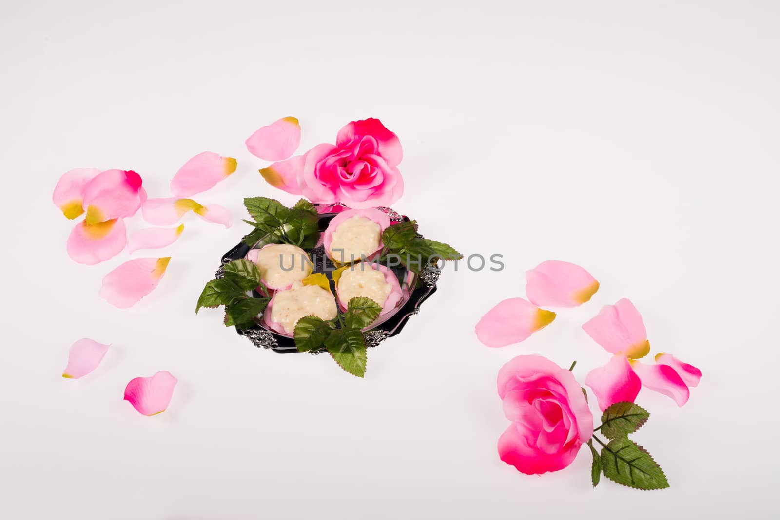 A sweet treat inside rose petals, a Valentines concept