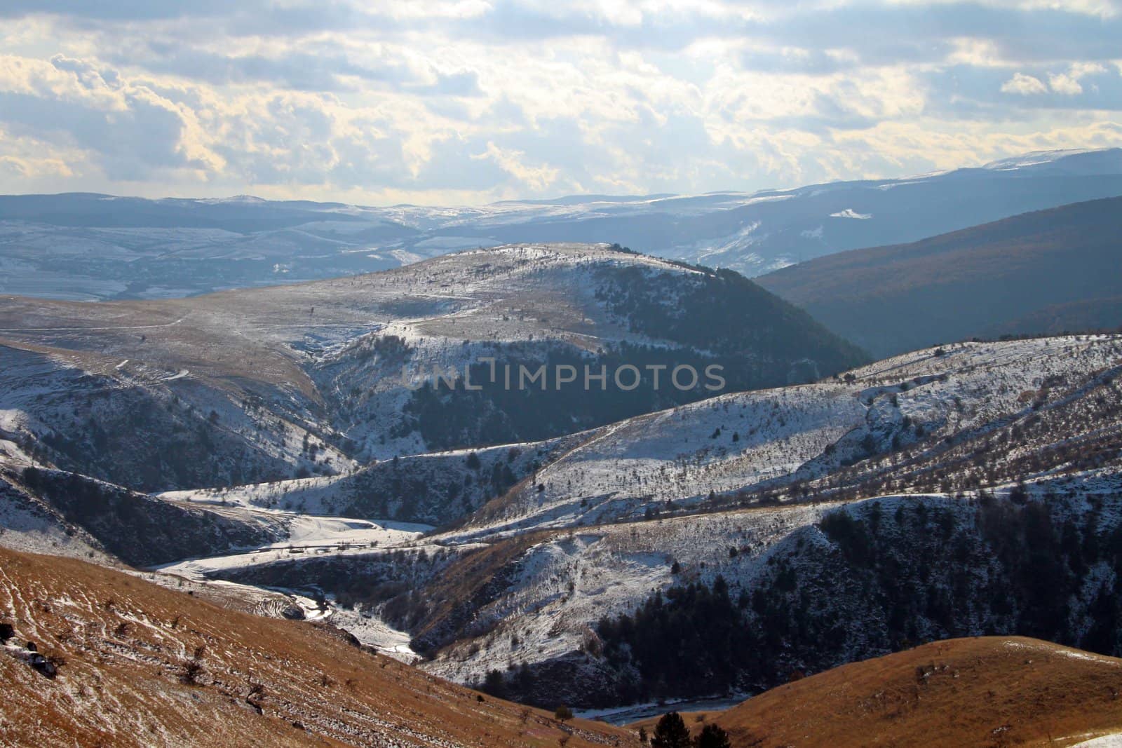 Winter mountain range by renegadewanderer