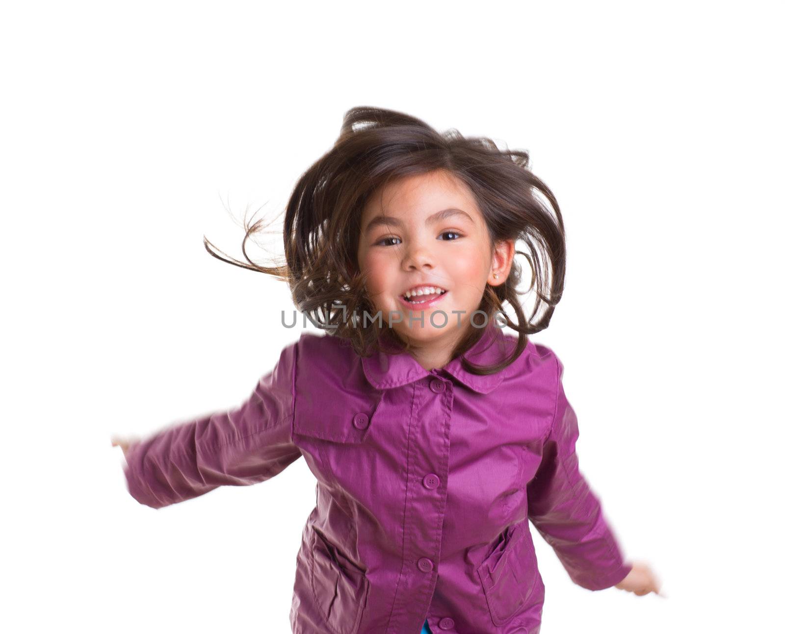 Asian child girl jumping happy with winter purple coat moving hair on white