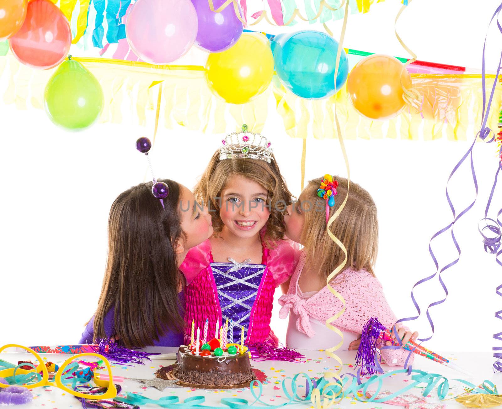Children girls group in birthday party greetings with a kiss by lunamarina