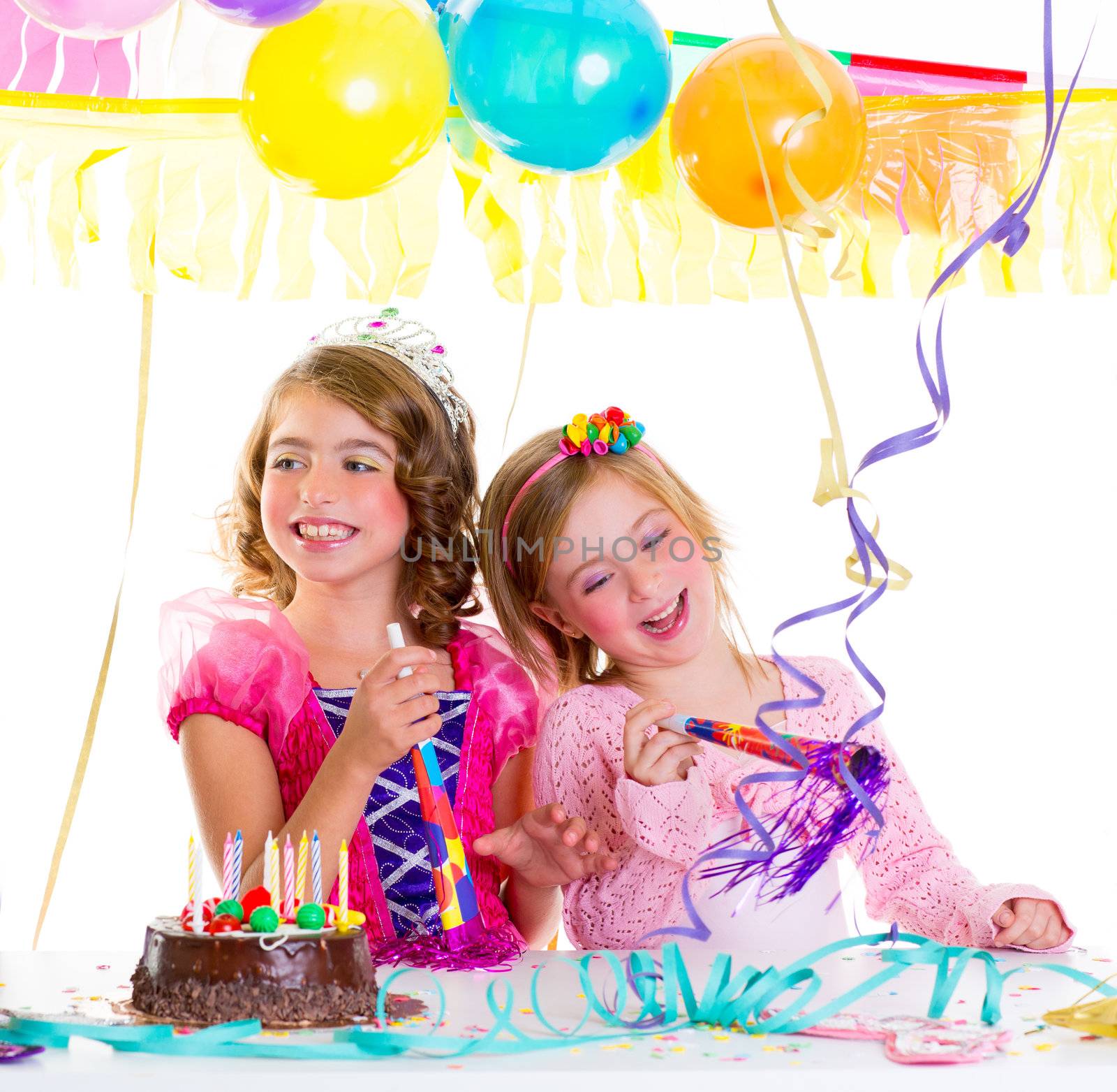 children kid in birthday party dancing happy laughing with balloons serpentine and garlands