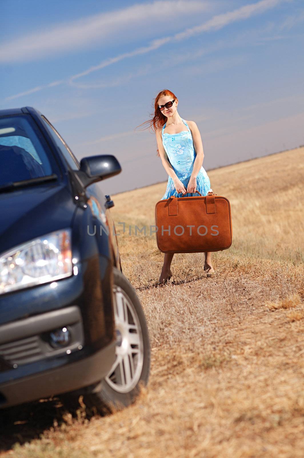 young girl near the car
