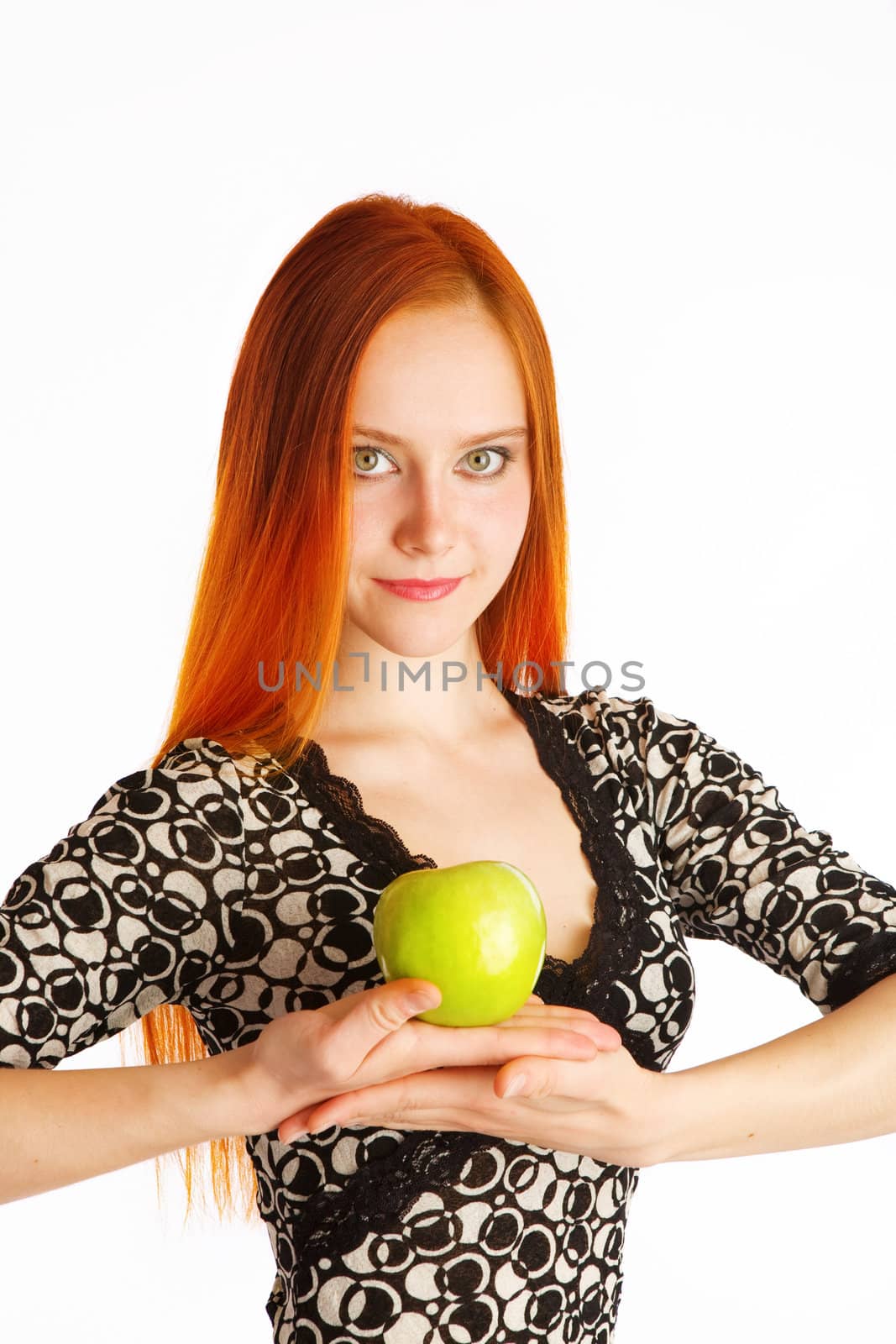 green tasty apple in hands of the girl