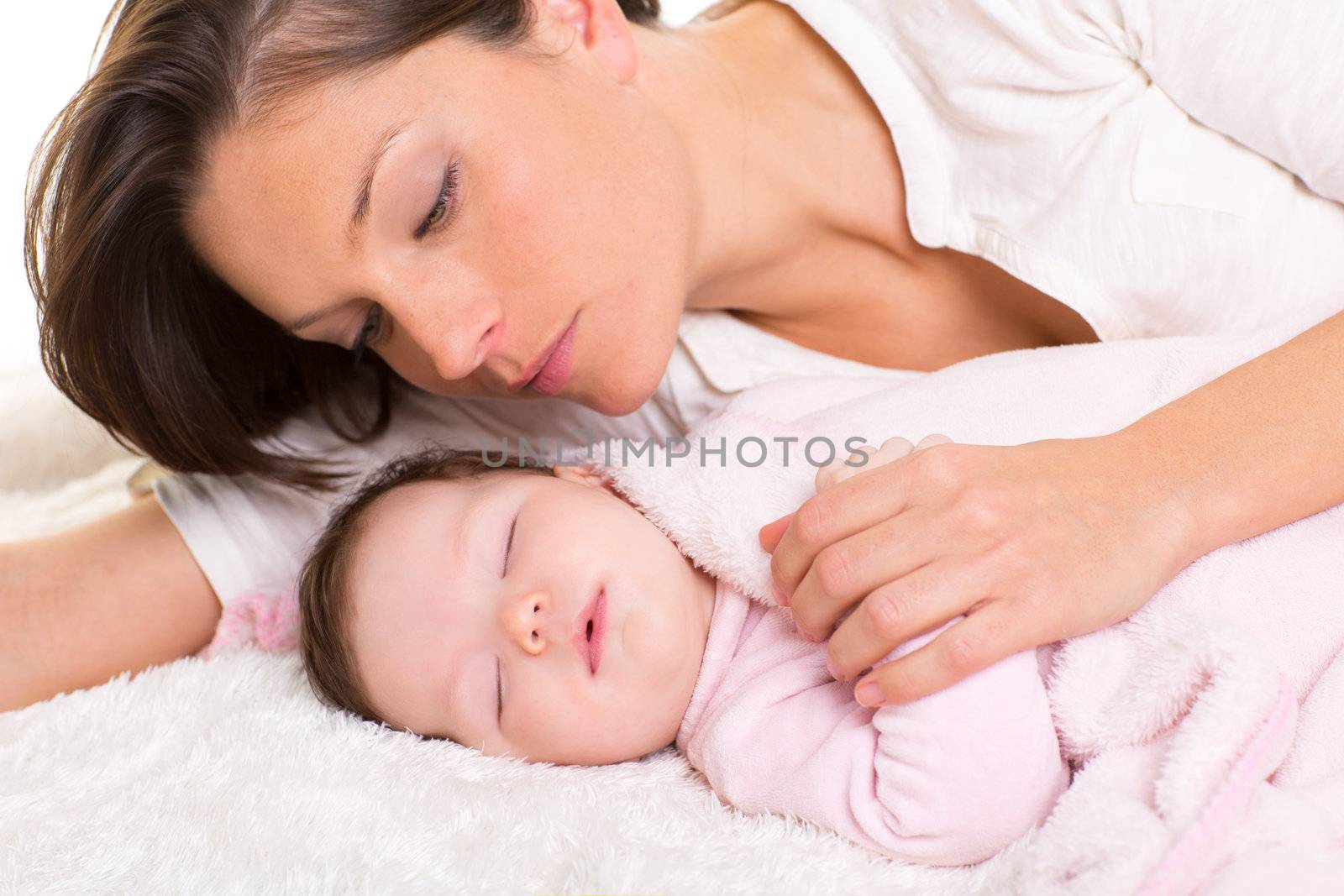 Baby girl sleeping with mother care near by lunamarina