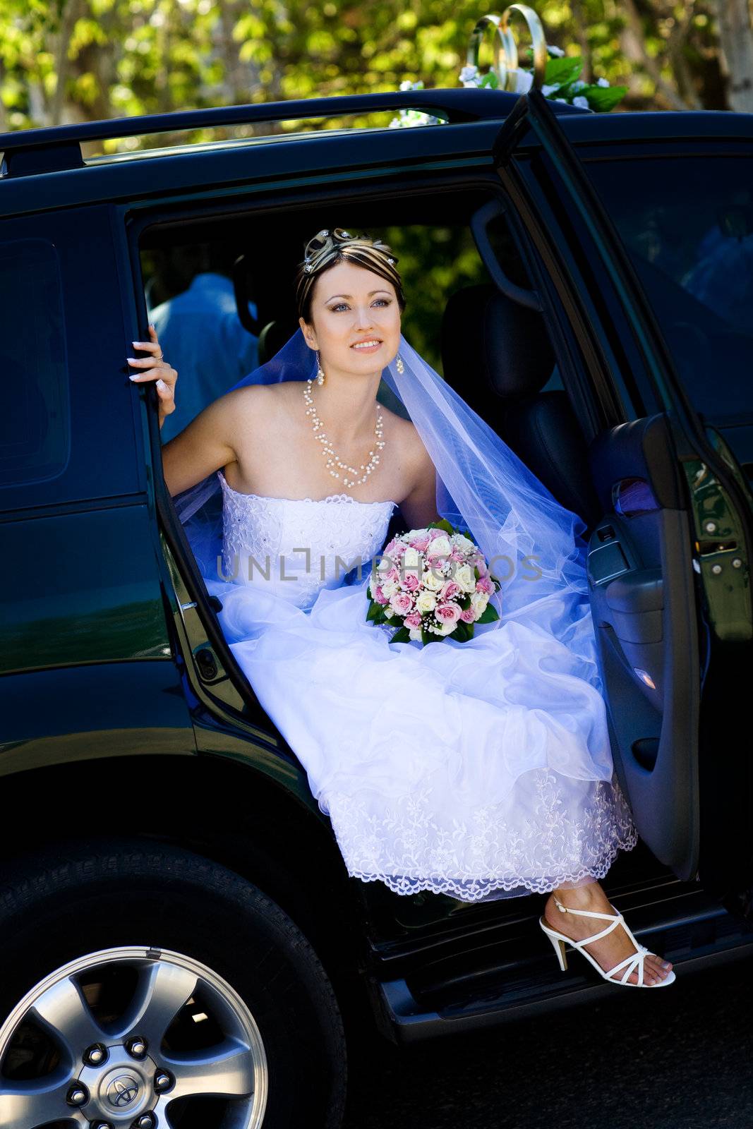 portrait of the bride in the wedding car by vsurkov