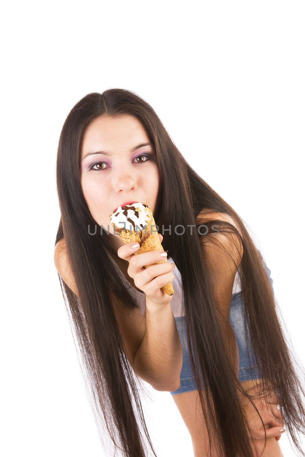 pretty girl with long hair eats ice-cream