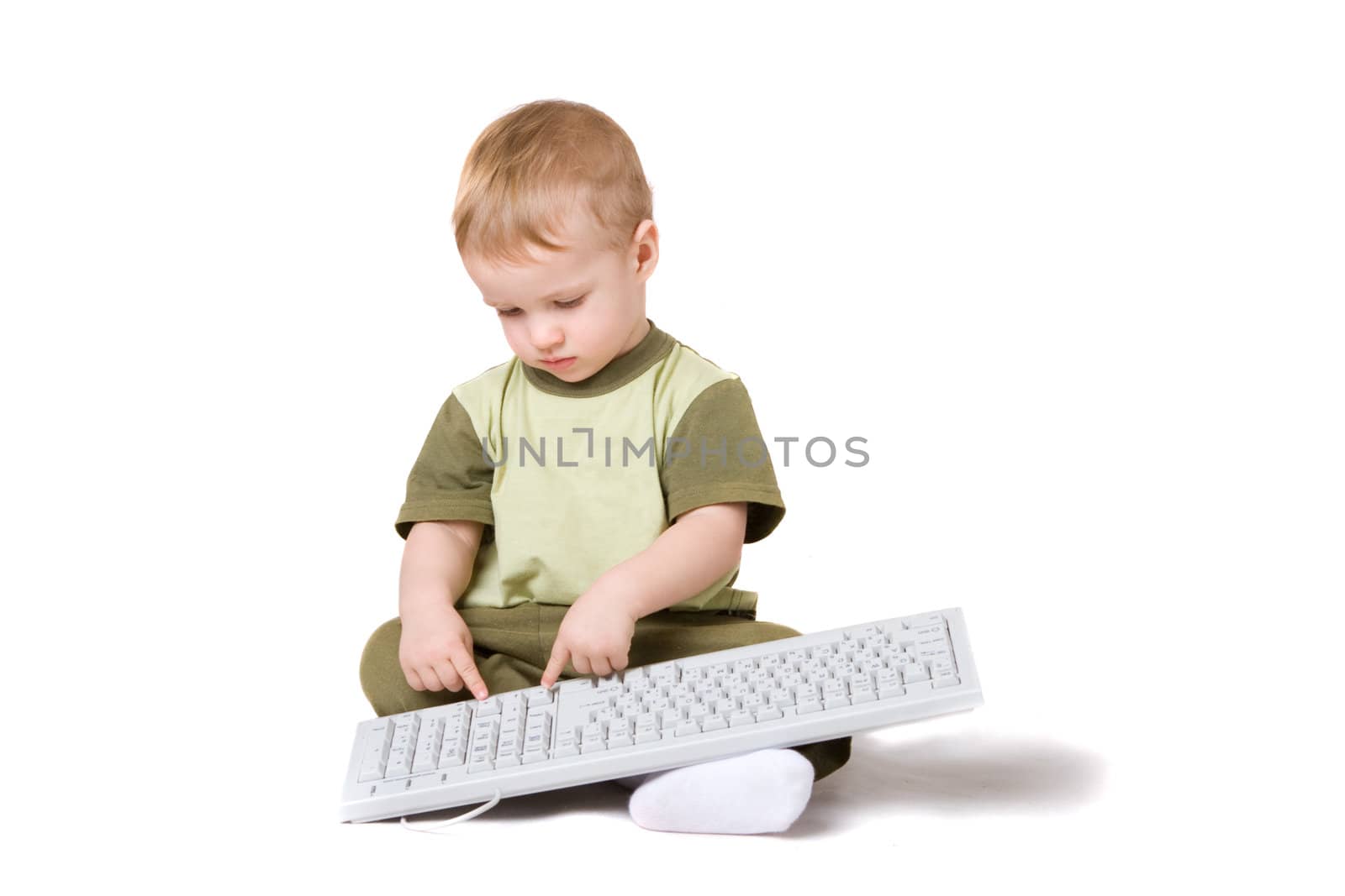a small boy with keyboard