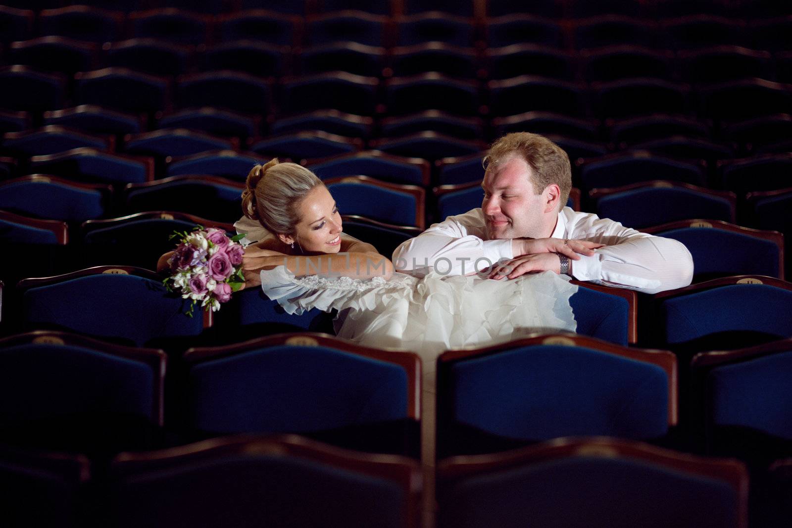 bride and groom at the theatre