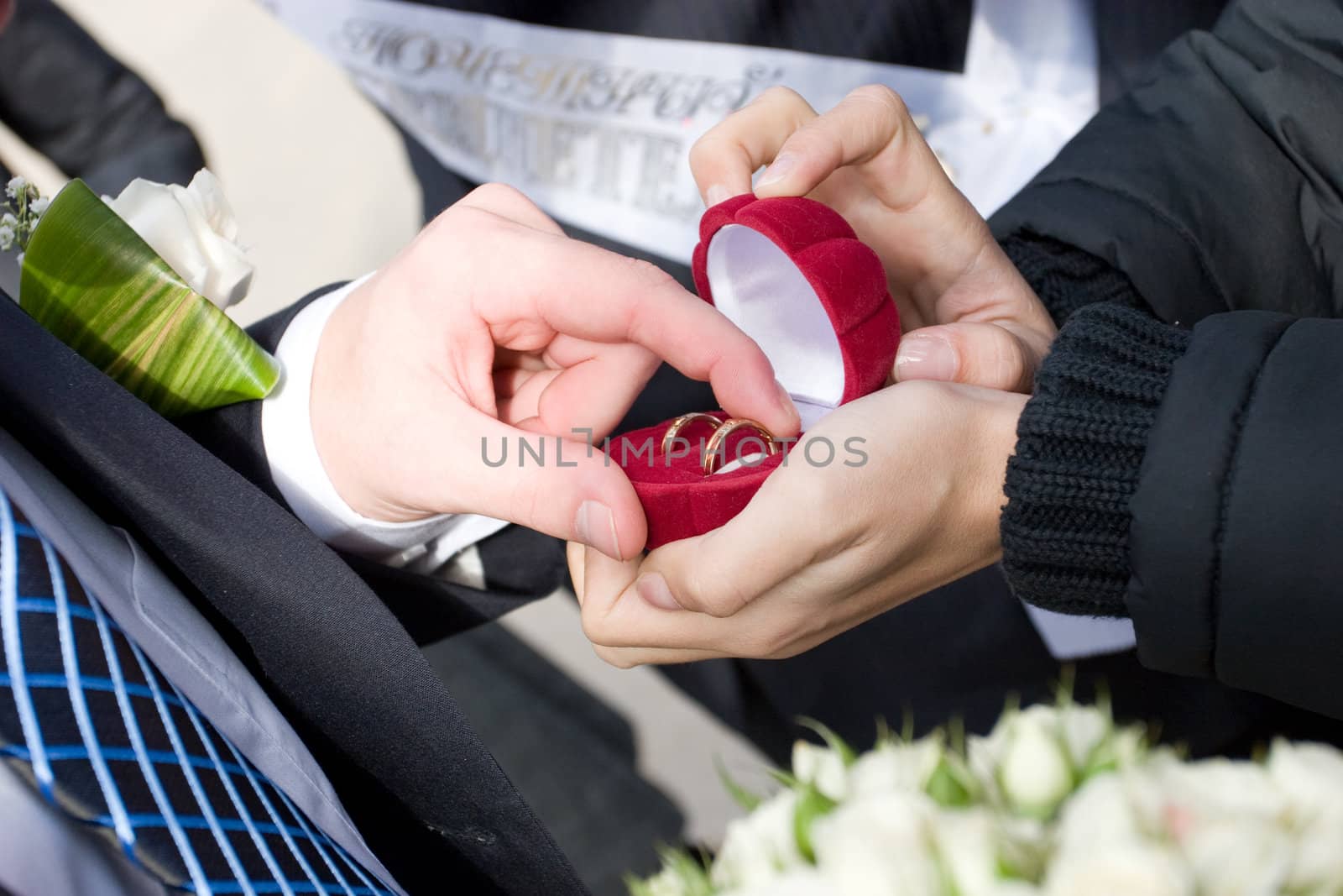two wedding rings in the box which takes a man