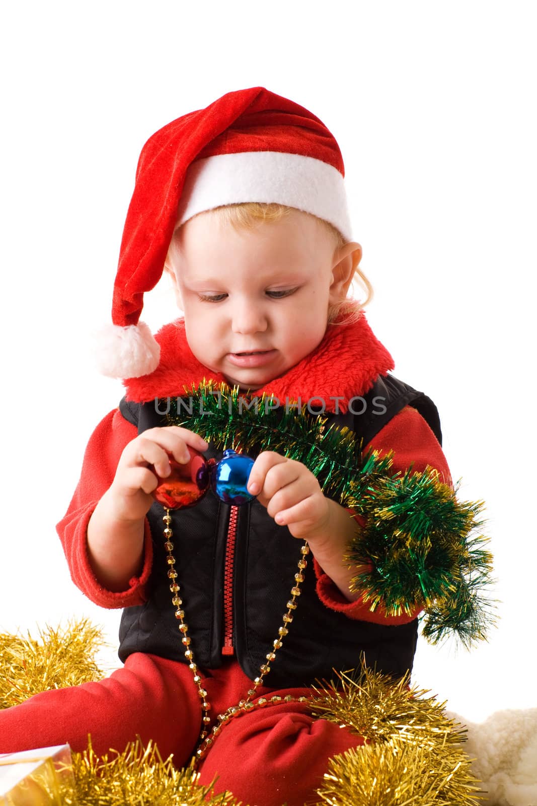 child in santas cap by vsurkov