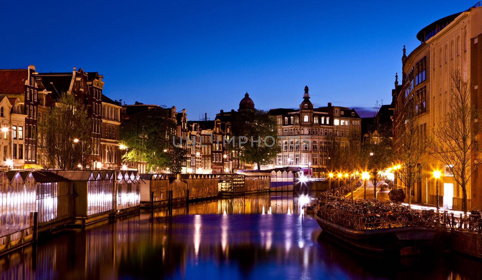 Beautiful night view of the channel in Amsterdam