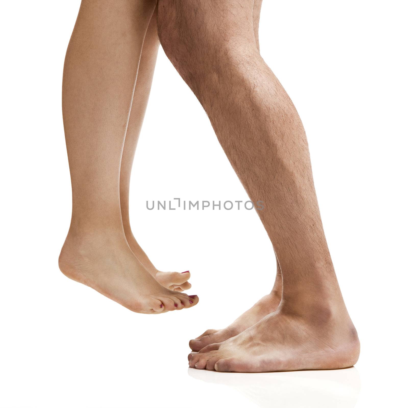 Man and woman legs isolated on a white background