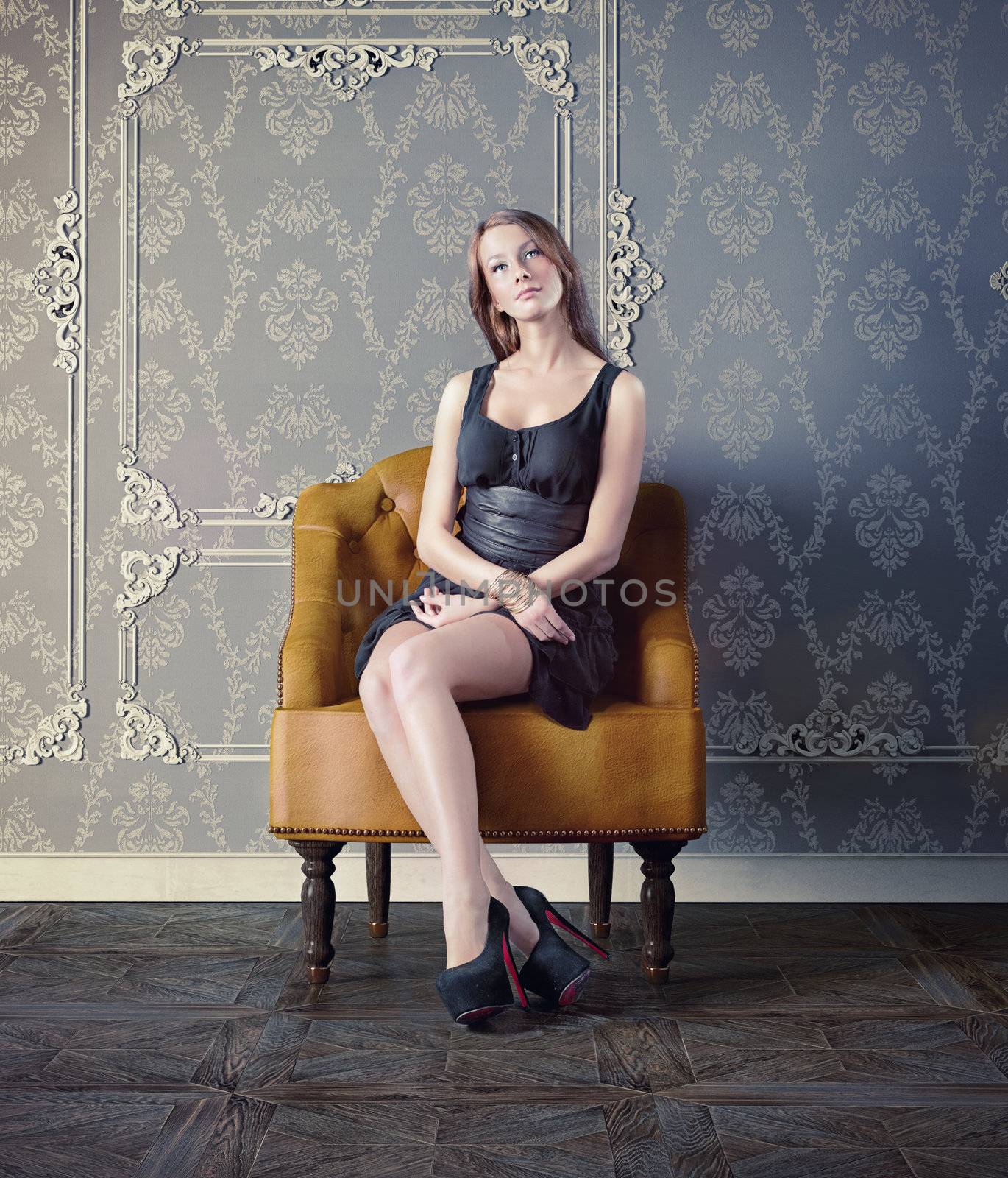 beautiful woman in luxury armchair 