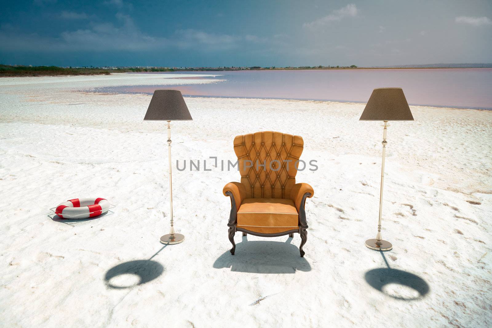 luxury leather armchair on the beach (photo compilation concept)