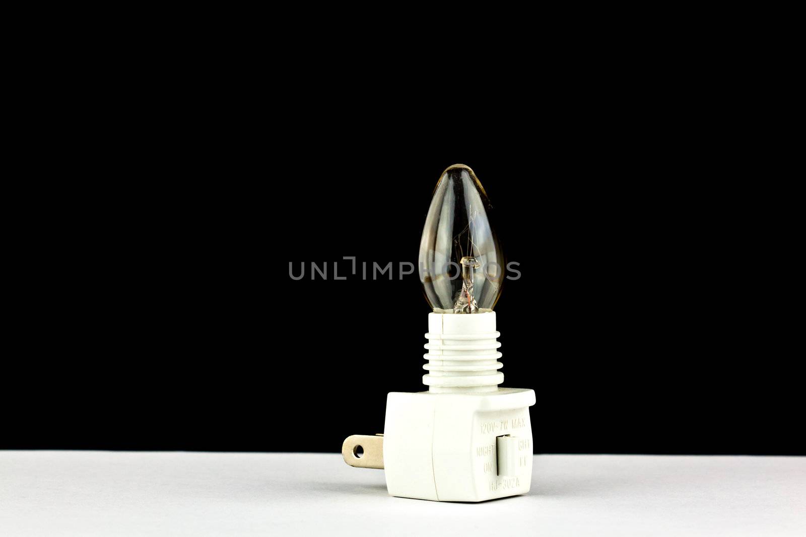close up of a white mini wall lamp
