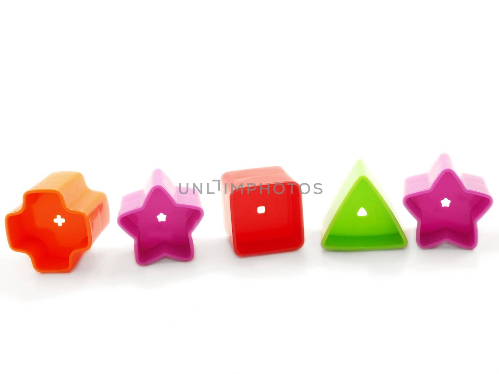 Shapes of plastic, toys for kids, isolated towards white