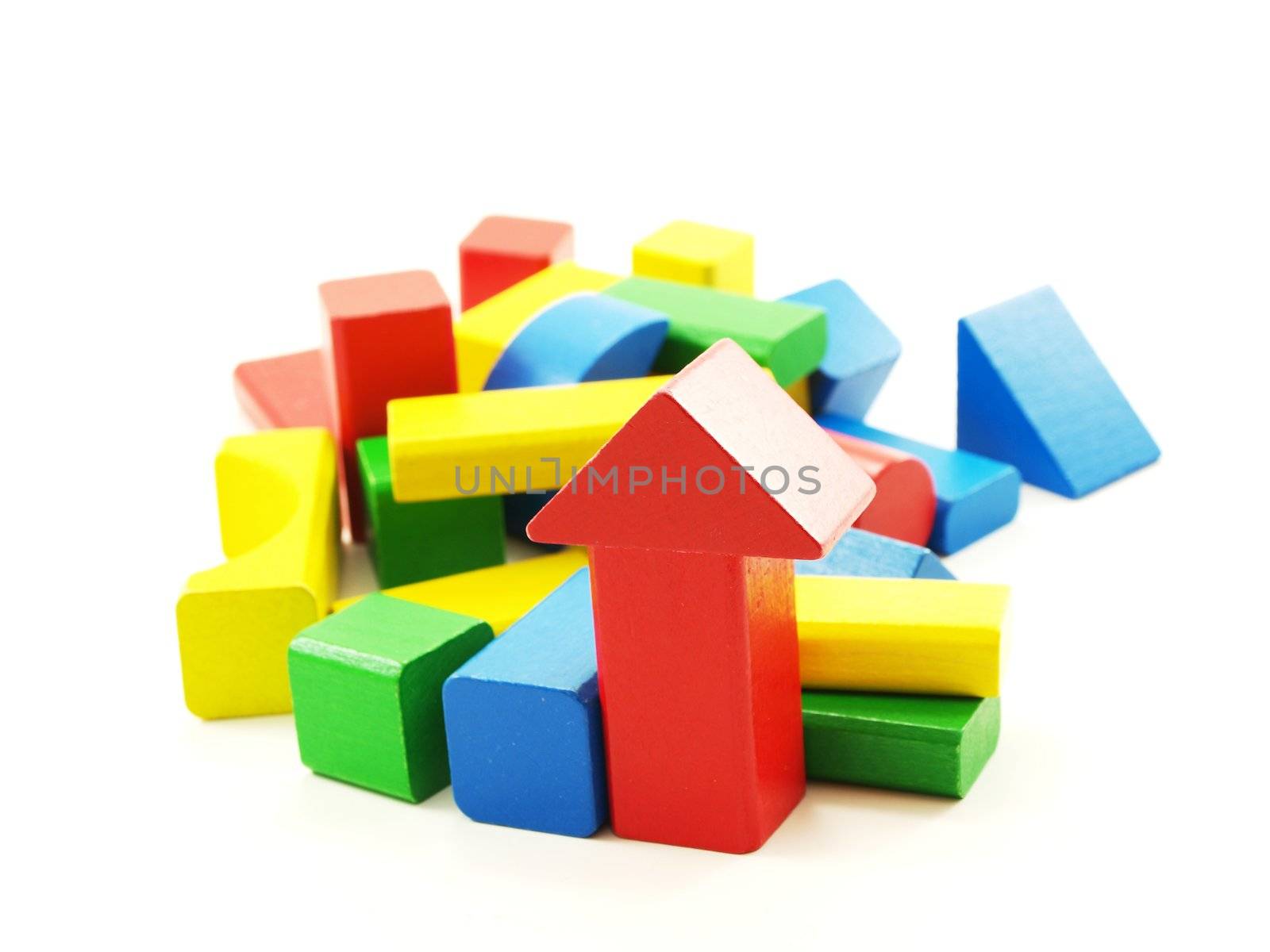 Pile of colorful wooden bricks by Arvebettum