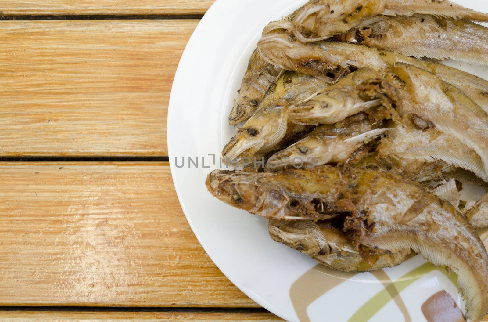 Fried fish on dish, delicious thai food