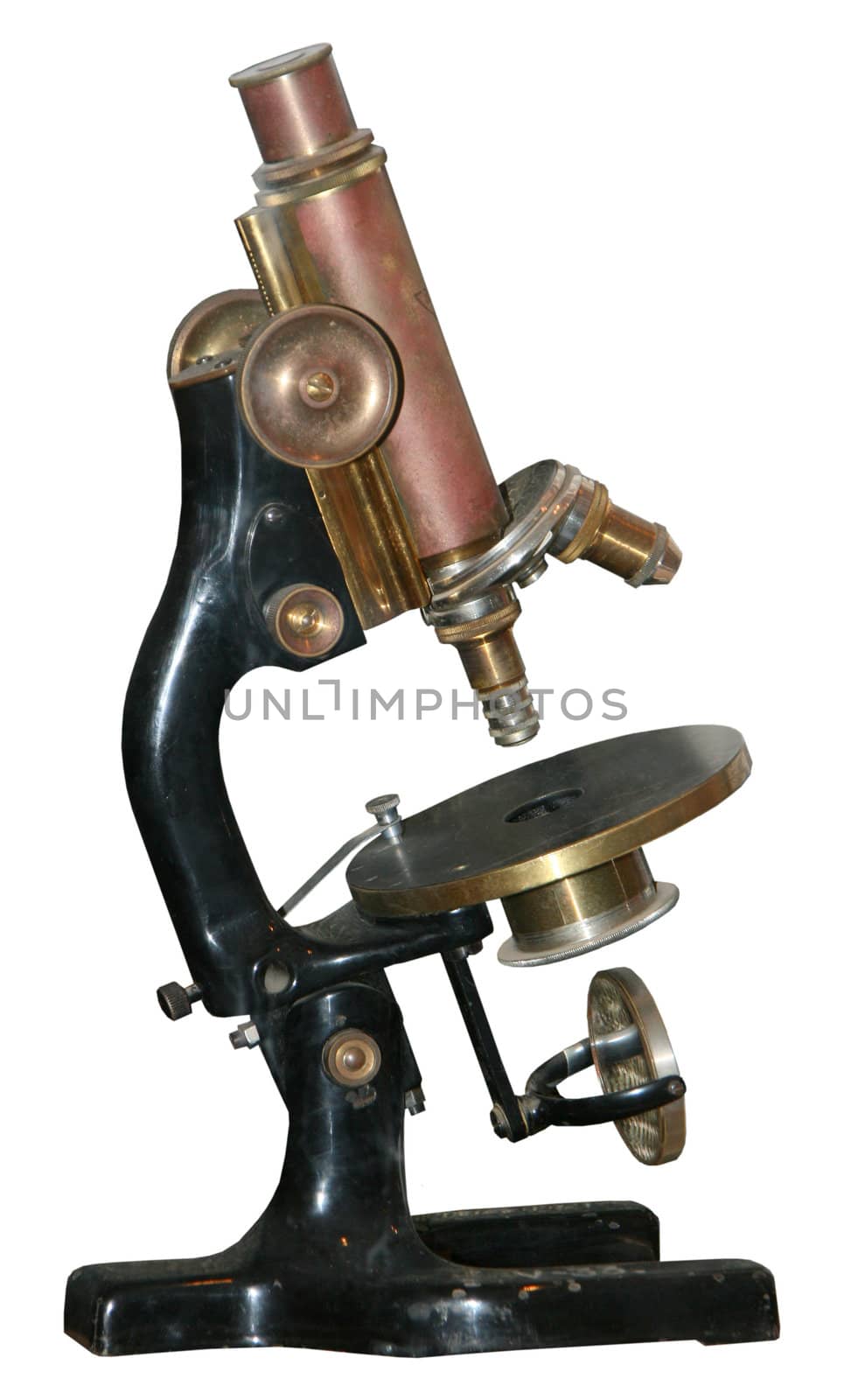 vintage microscope on white background by fotosergio