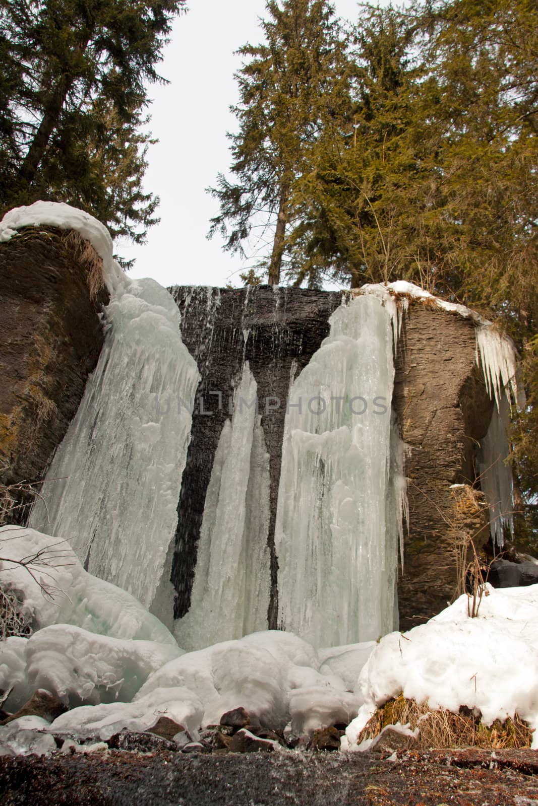 A frozen waterfall by renegadewanderer