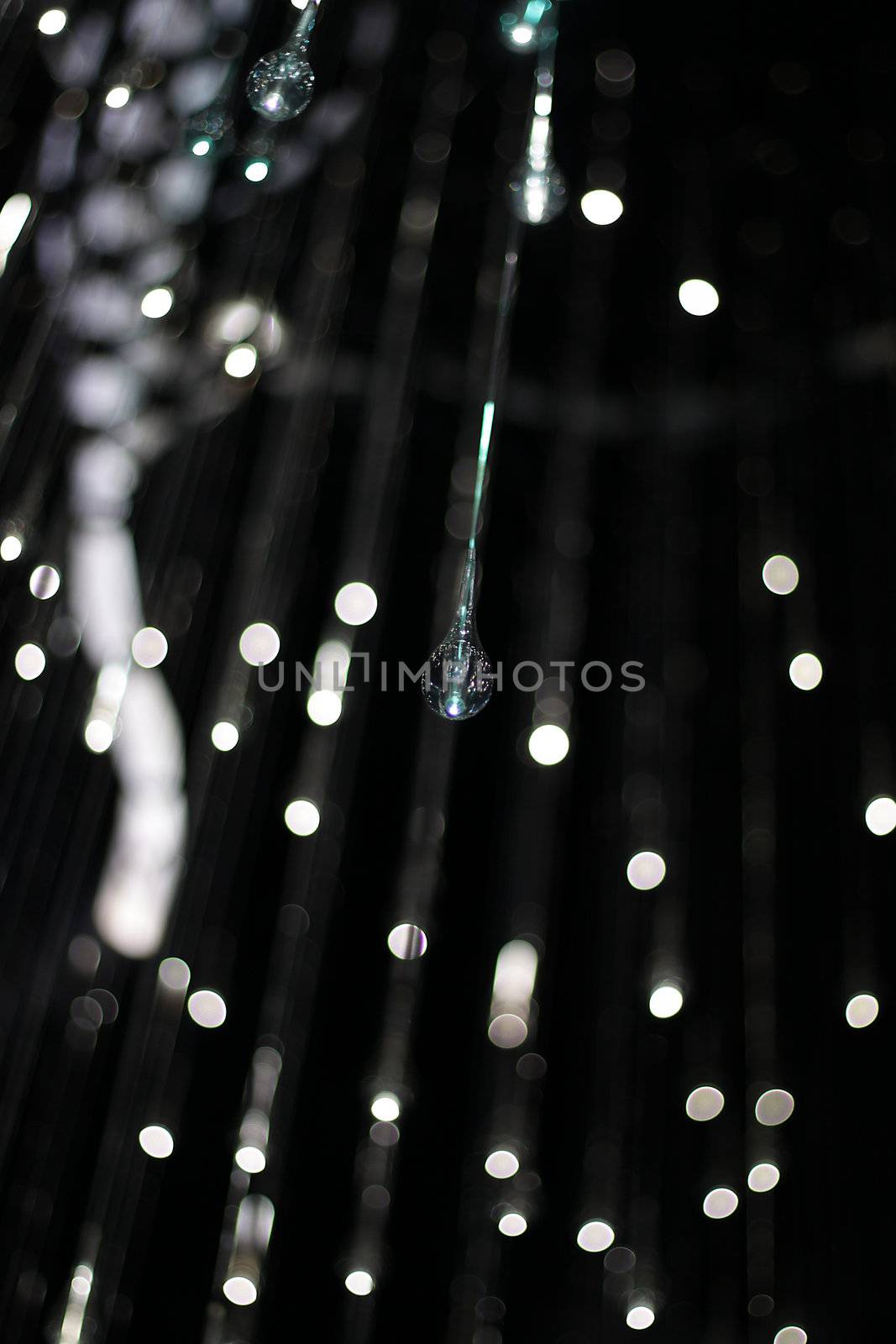 Hanging crystals creating a blurred light with bokeh and bright lights