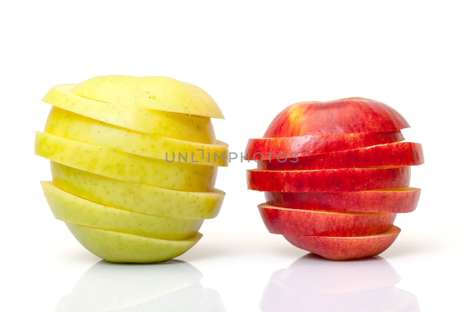 Red and Yellow Sliced Apple, on white background