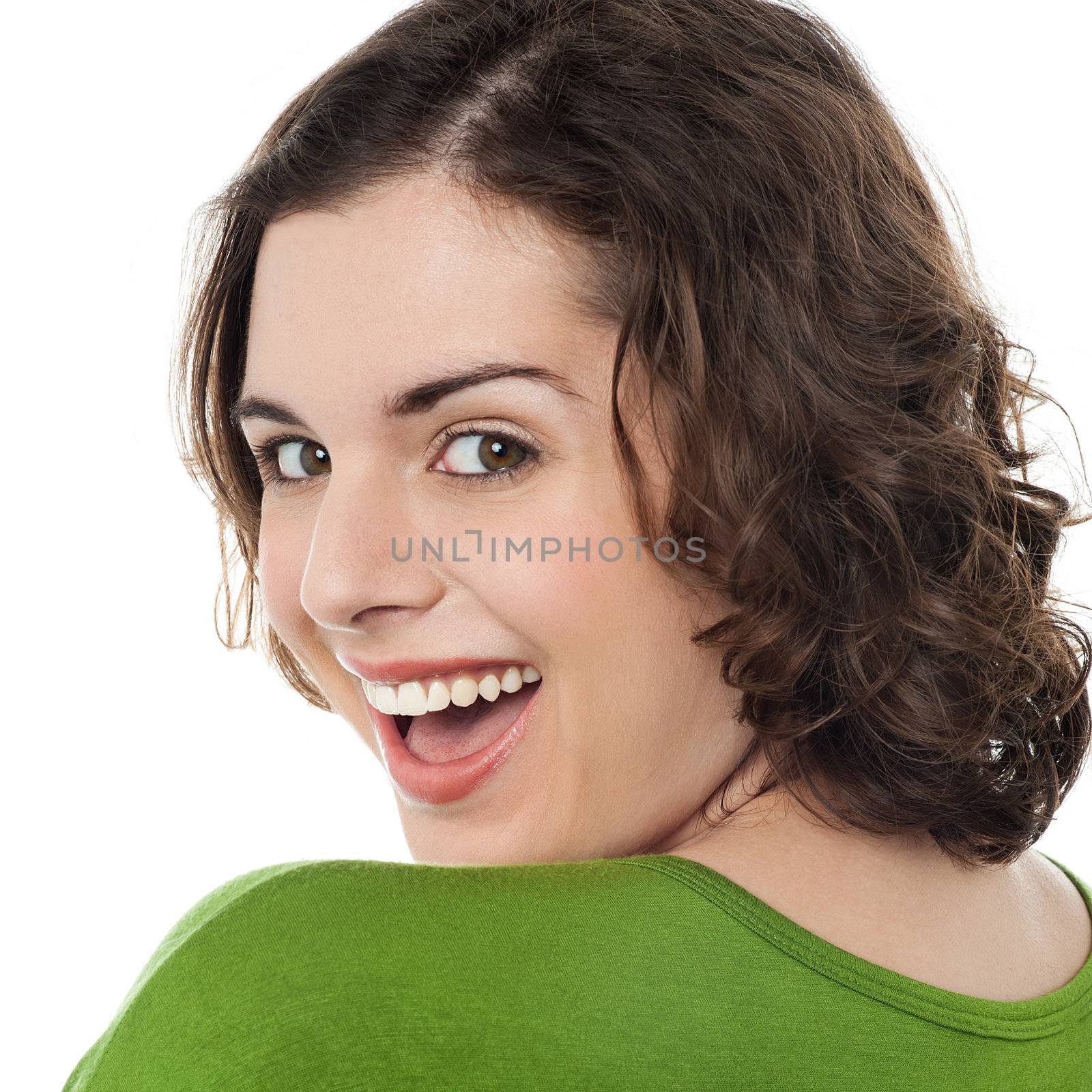 Excited caucasian woman looking at you by stockyimages