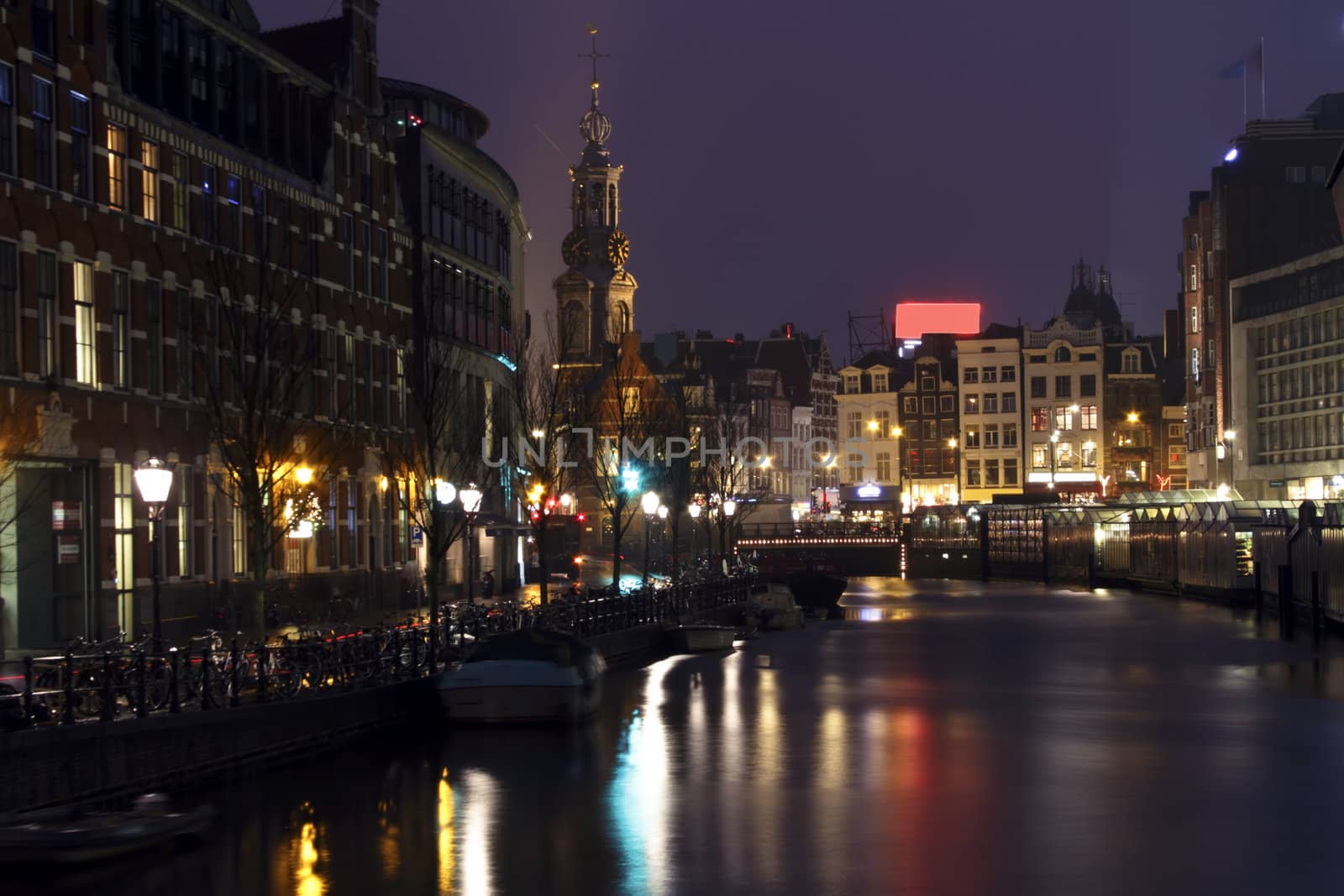City scenic from Amsterdam with the Munttower at night in the Ne by devy