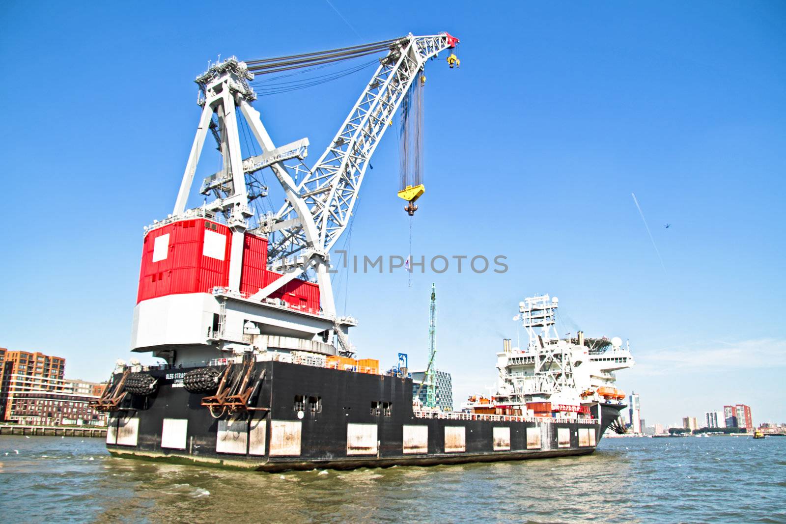 Cargo container ship in Rotterdam harbor in the Netherlands