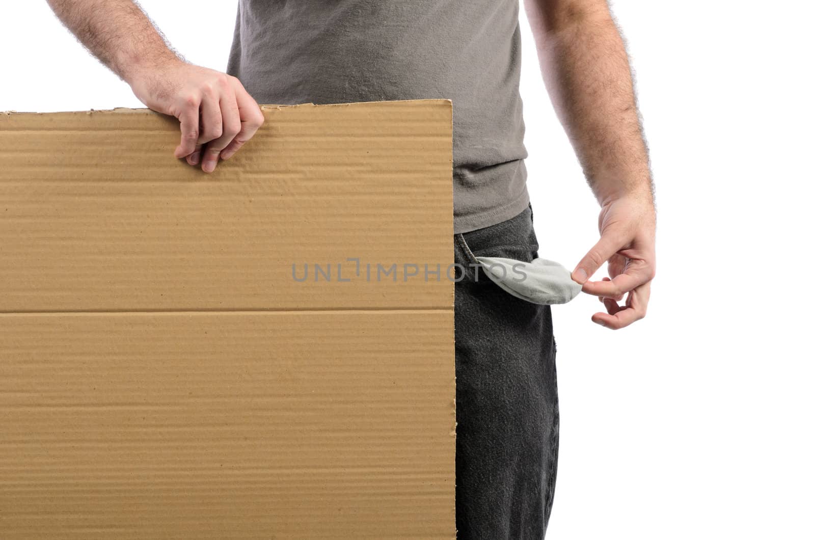 A moneyless man holding a cardboard sign with his pocket emptied out.