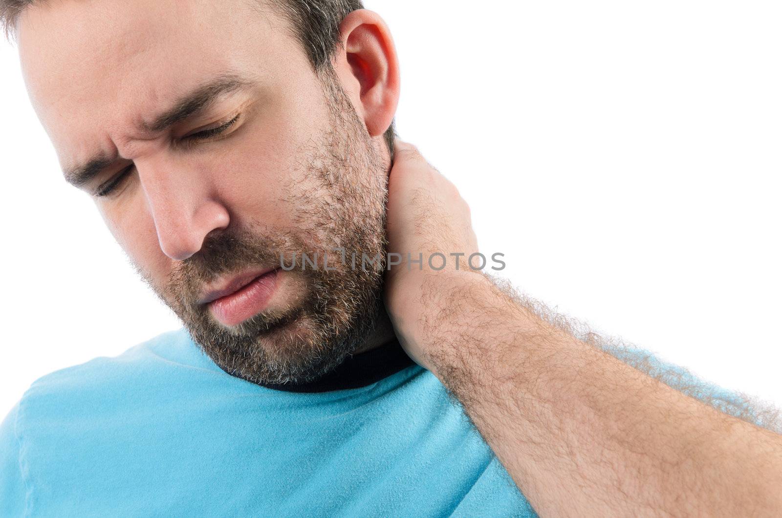 A bearded man holding his injured neck, isolated on a white background.