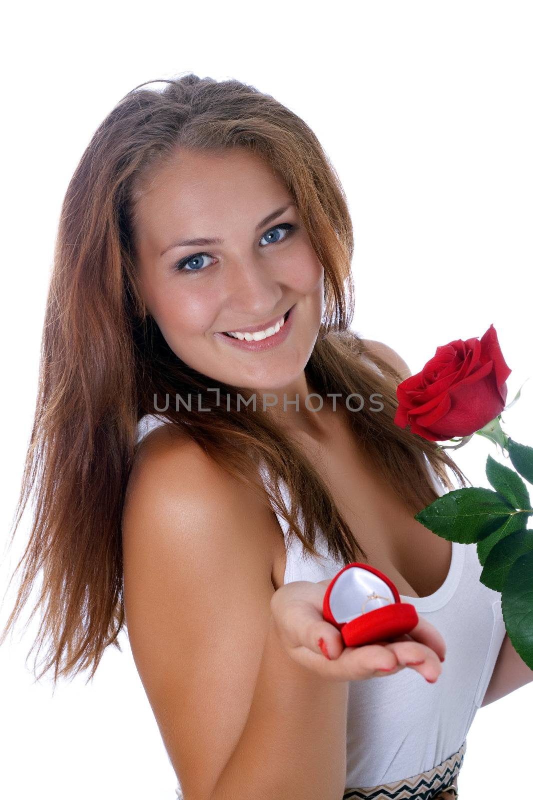 girl was presented with a red rose and a box with a ring