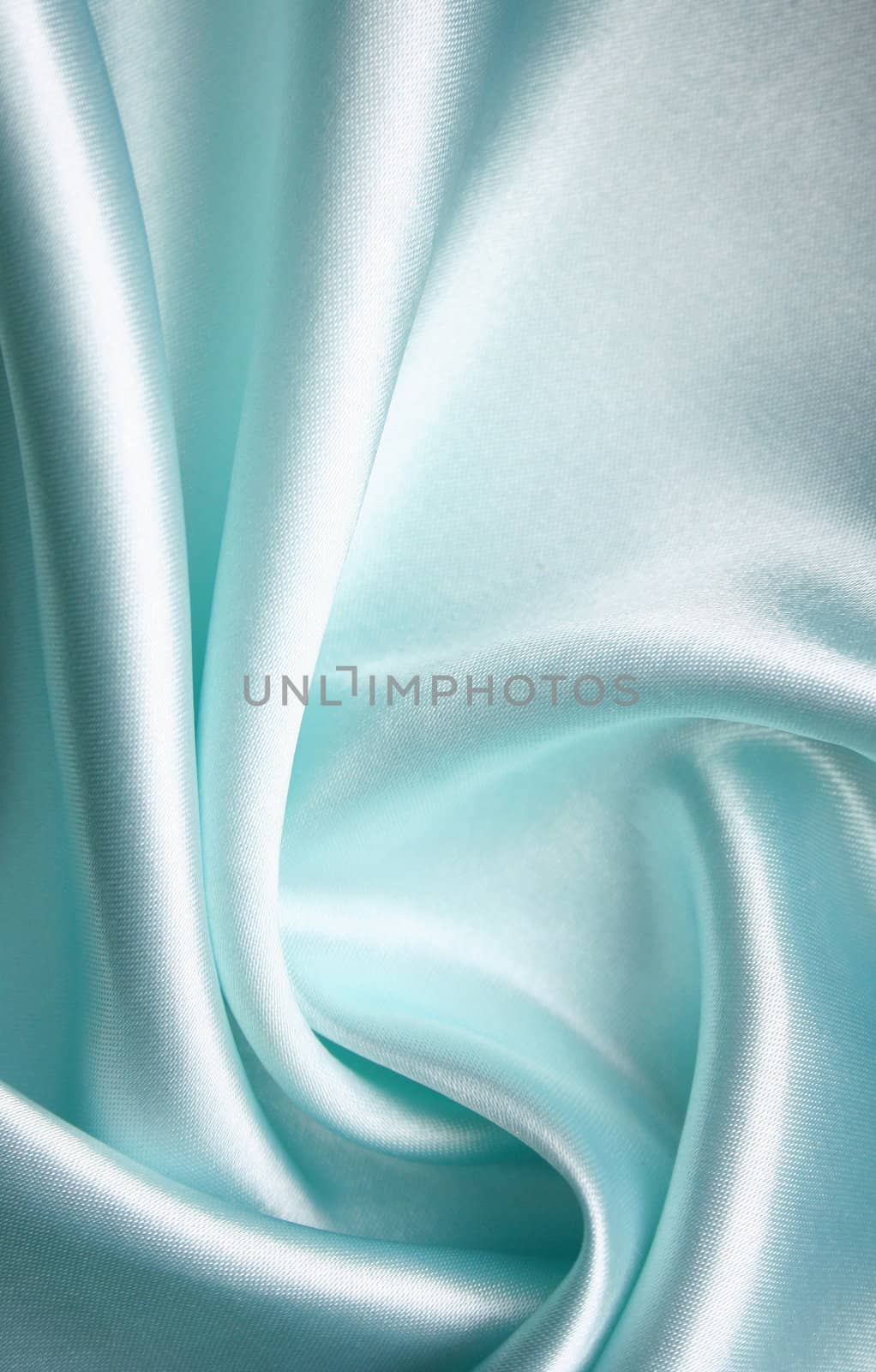 Smooth elegant blue silk as background by oxanatravel
