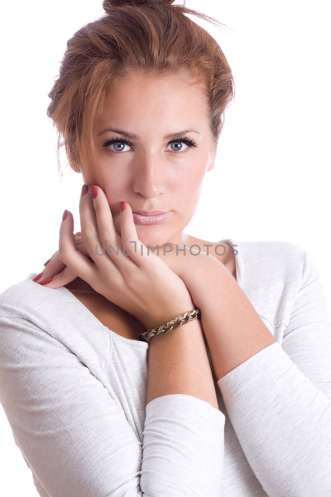 Portrait of a beautiful girl with piercing eyes isolated