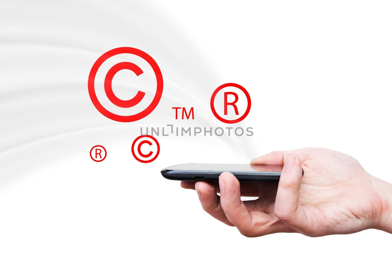 Copyright, trademark symbols flying from smartphone by simpson33