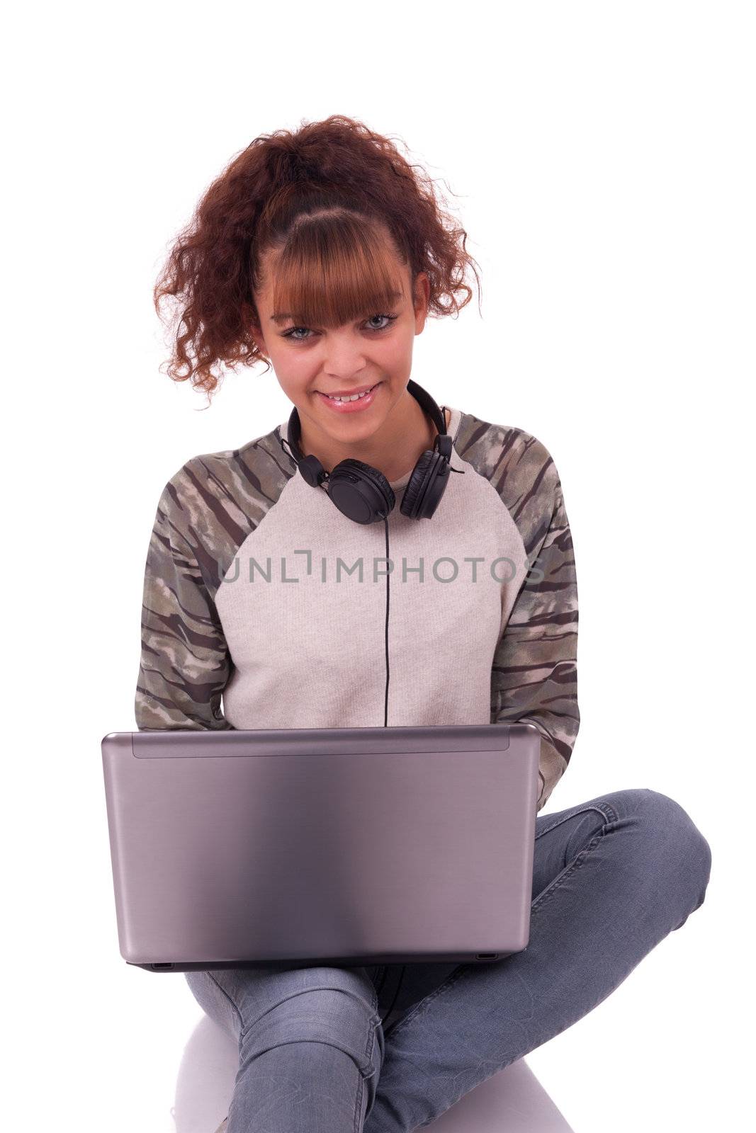 young Woman with laptop in background isolated by michel74100