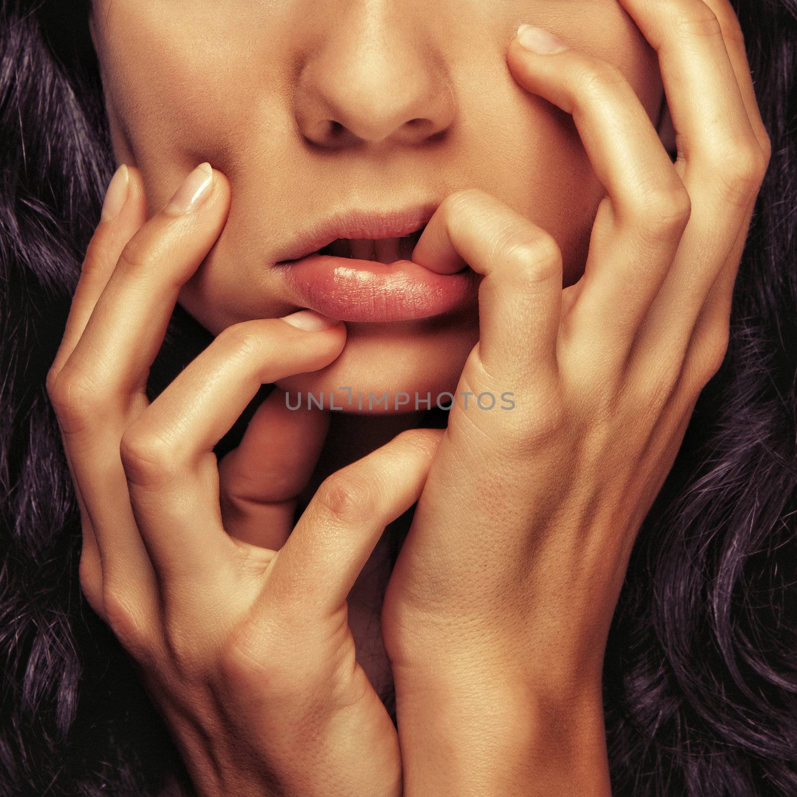 closeup detail cosmetics girl face and hands and fingers