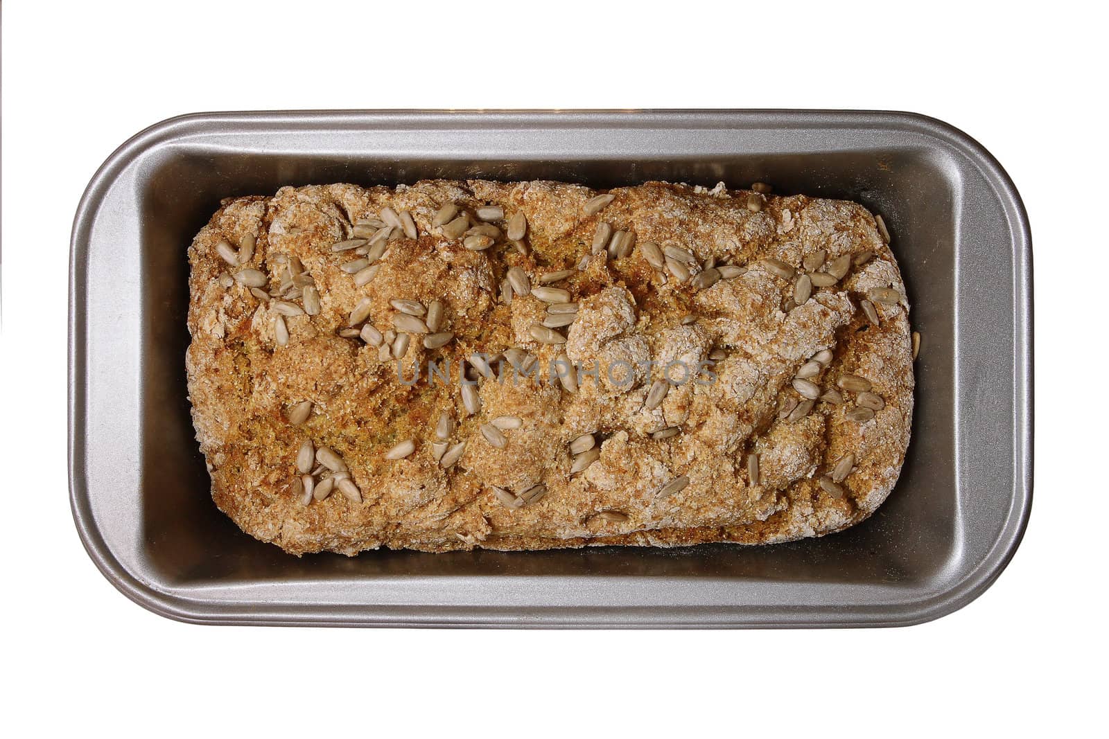 homemade quick bread with sunflower seeds by cococinema