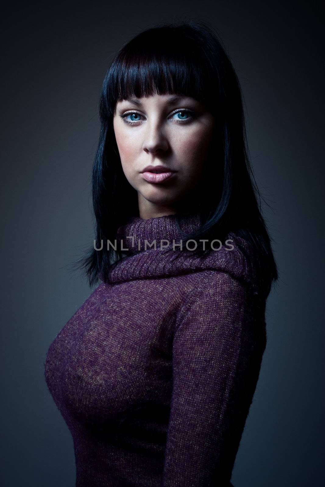 sexy girl in sweater with big breasts