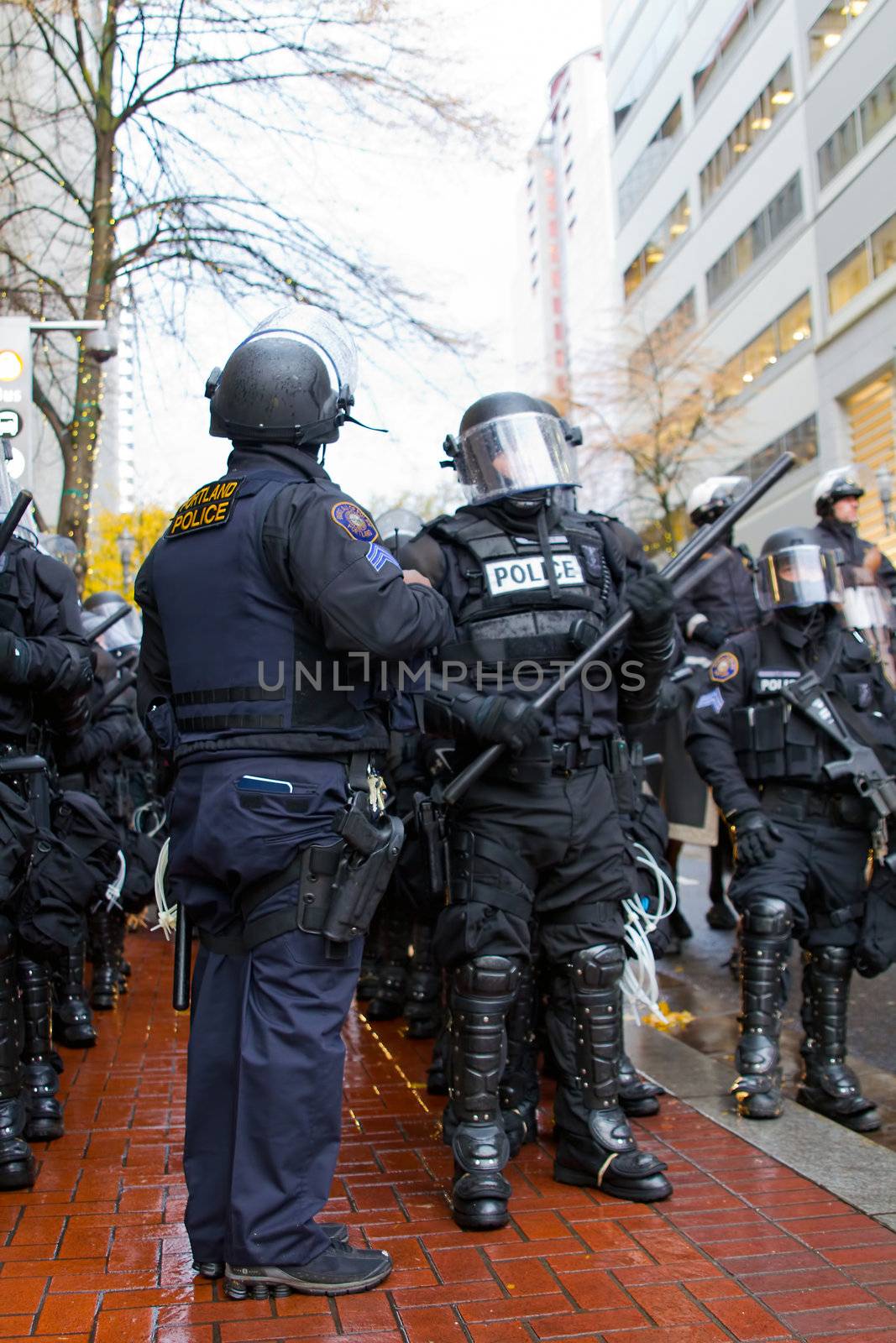 PORTLAND, OREGON - NOV 17: Police Sergeant and Cops in Riot Gear in Downtown Portland, Oregon during a Occupy Portland protest on the first anniversary of Occupy Wall Street November 17, 2011