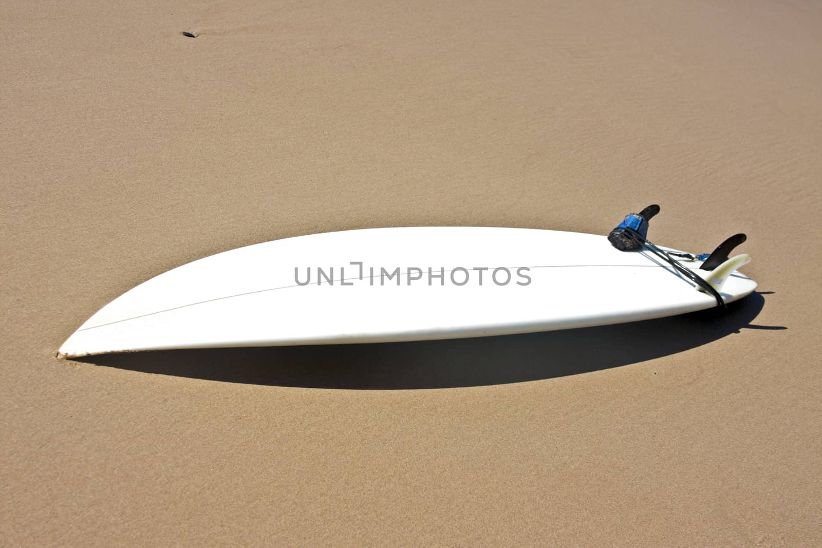 Surfboard at the beach by devy