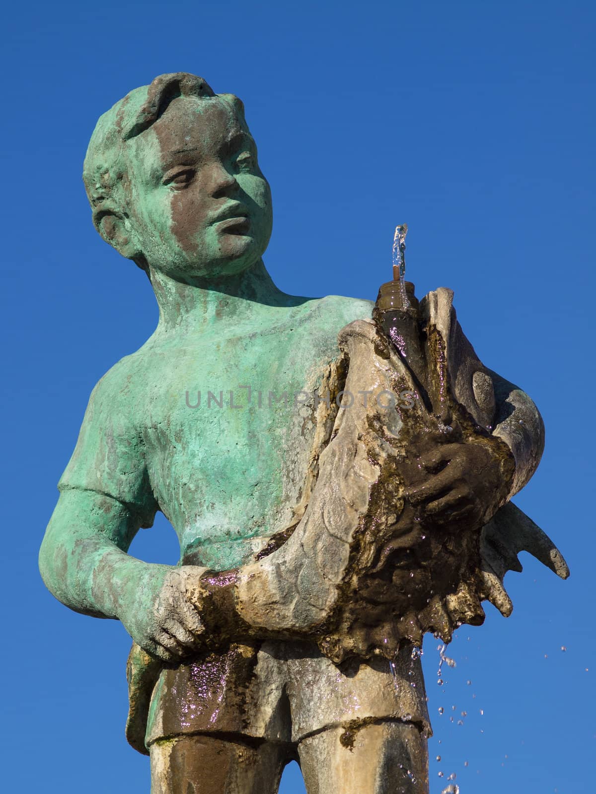 bronze boy fountain in Rovinj Croatia