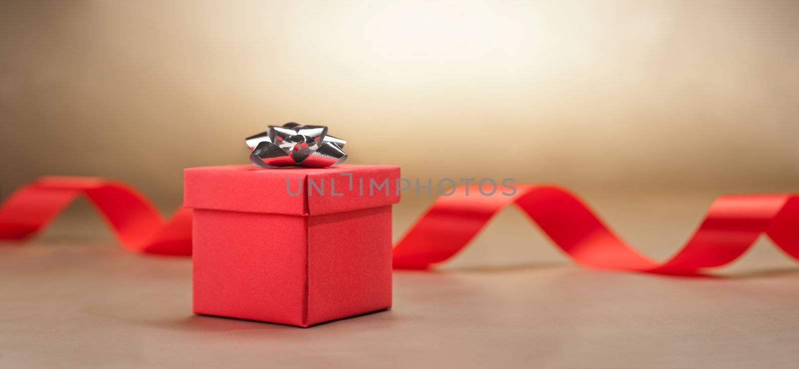 Present  in front of beige background nice for a wedding
