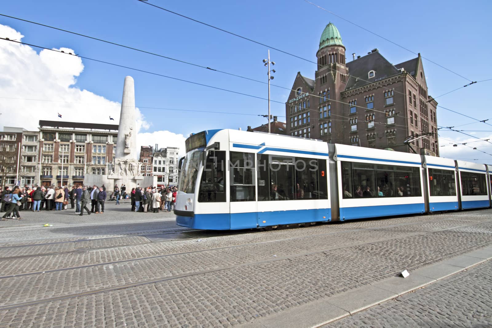 Tram driving at Dam square in Amsterdam the Netherlands by devy