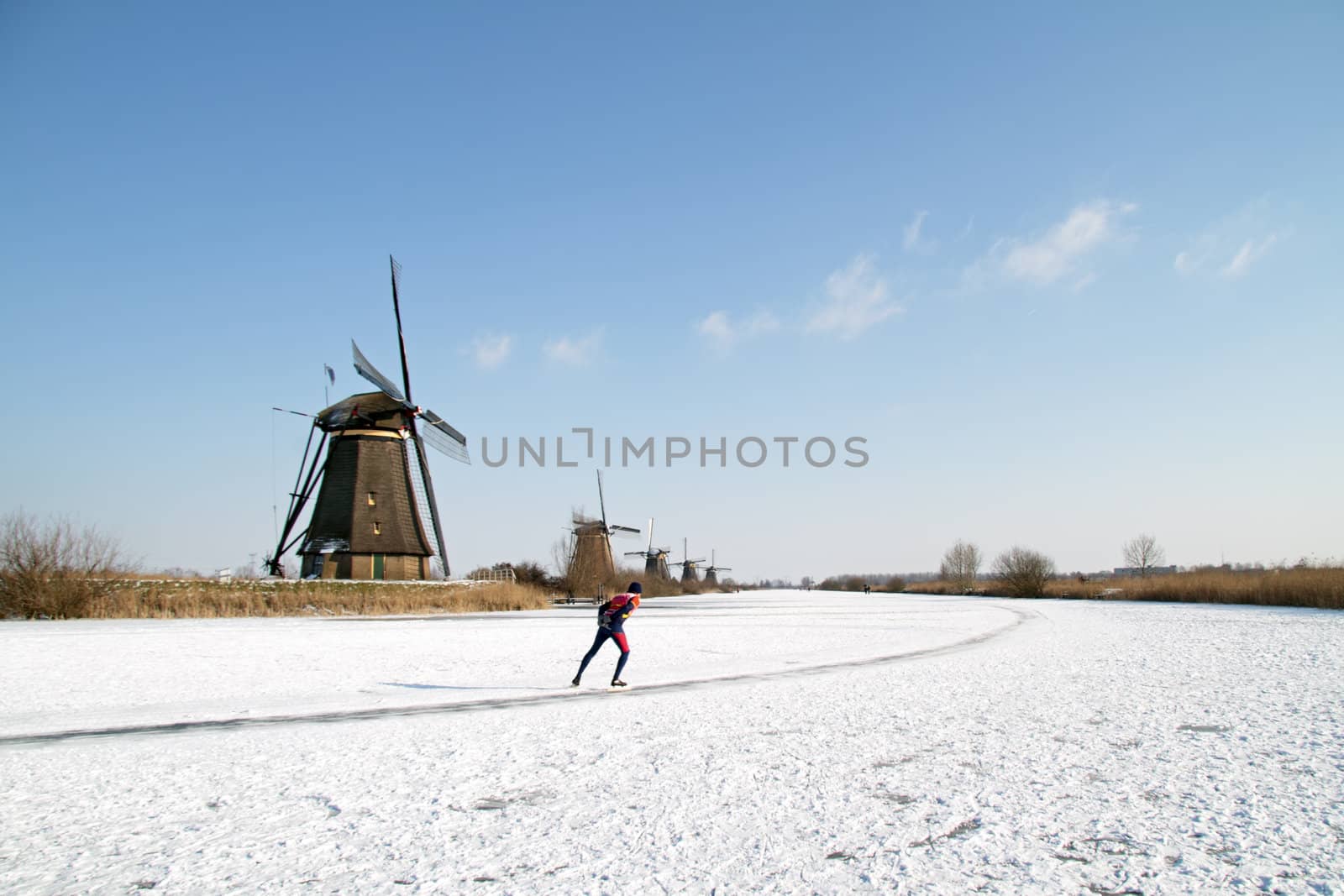 Ice skating at Kinderdijk in the Netherlands by devy